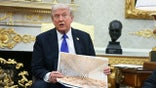 Trump holding new ballroom images