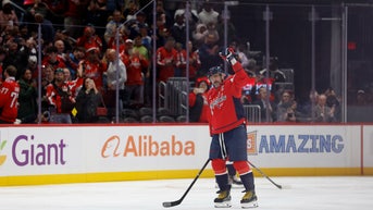 Alex Ovechkin becomes first NHL player to reach 900 goals as opposing goalie tries to hide milestone puck - Fox News