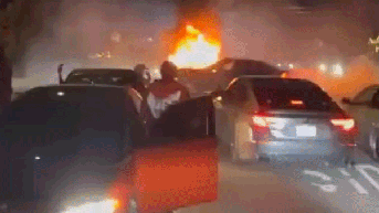 Violent mob caught on video beating man, torching car during wild neighborhood takeover - Fox News