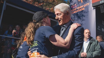 Bill Clinton spotted at NYC Marathon with bandaged nose while cheering on daughter Chelsea