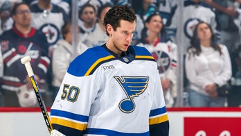 Blues goalie clarifies intentions after trying to pocket puck from Alex Ovechkin's 900th goal