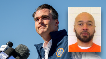 Republican governor spares life of death row inmate in final hours before execution