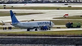 Flights at Reagan National Airport near Washington, DC, grounded due to 'reported security issue': FAA