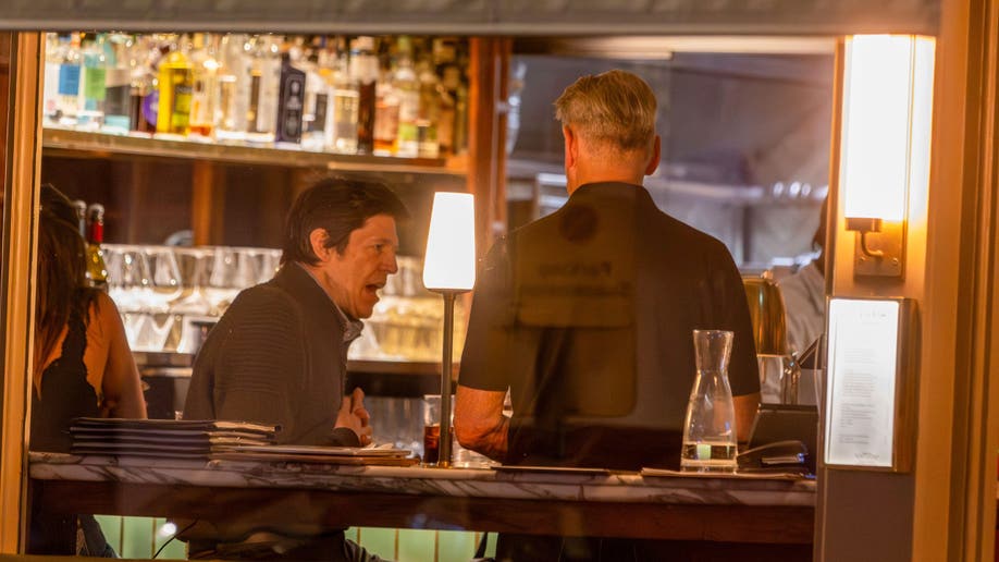 Christopher Brosnan sits at the bar inside Dorian restaurant in London during a family dinner.