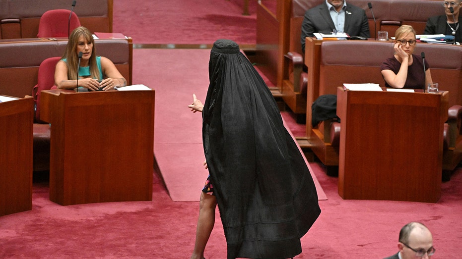 Australian senator wears burqa after move to block her face-covering ban bill