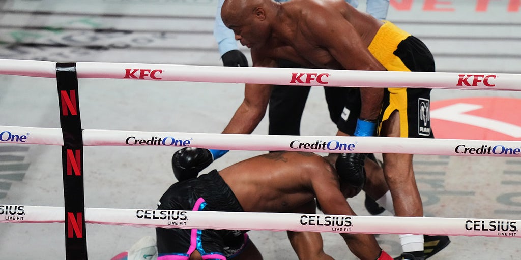 Anderson Silva catches Tyron Woodley with brutal punches in TKO win