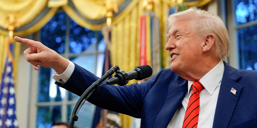 president donald trump pointing gestures smiling