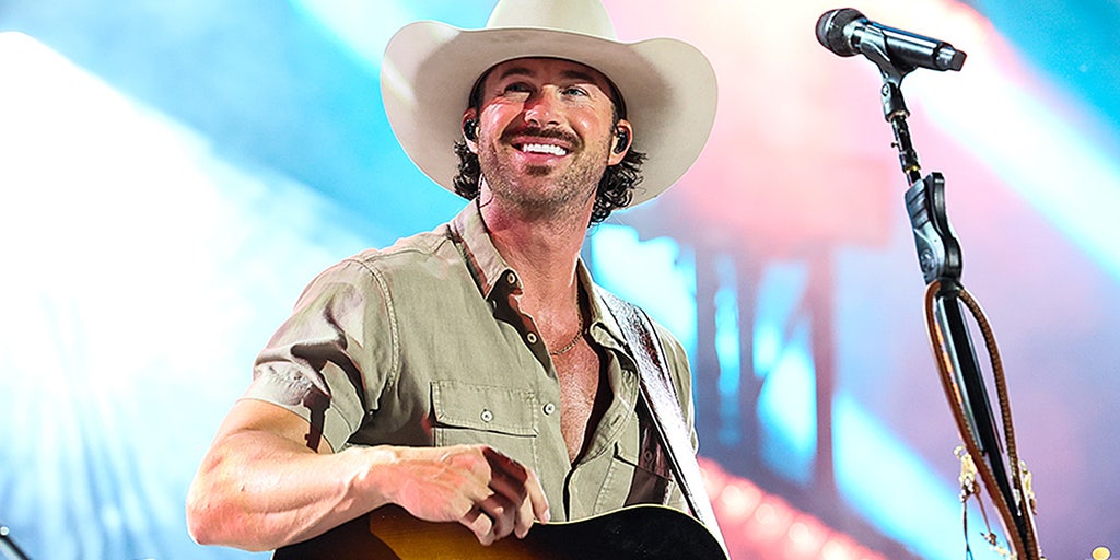 country singer dressed in black and green star Riley admits fame is 'not reality' compared to farm life Alabama 2026-07-01