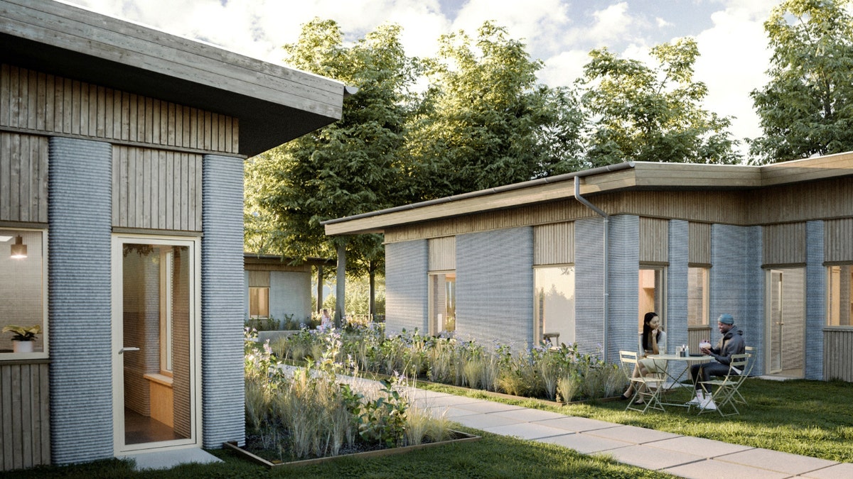 Modern student apartments with landscaped walkways.