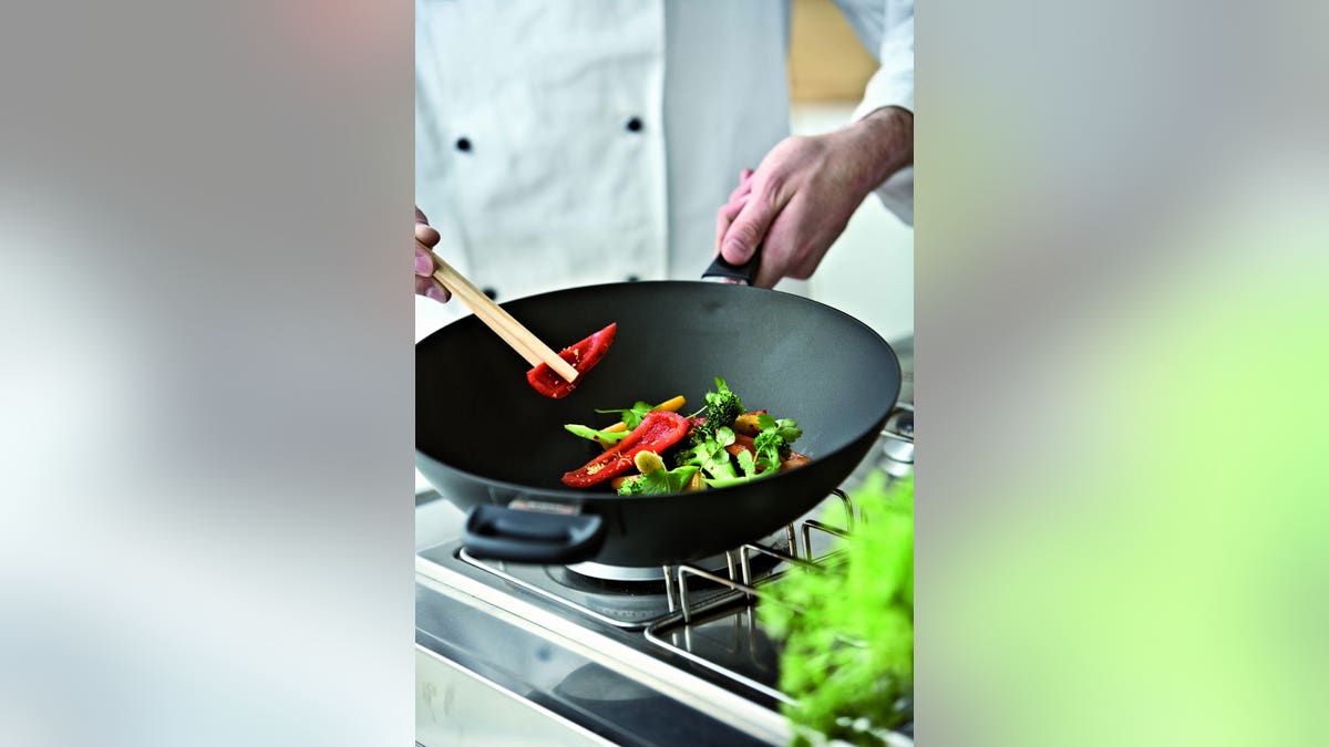 This wok can handle whatever you're cooking up.
