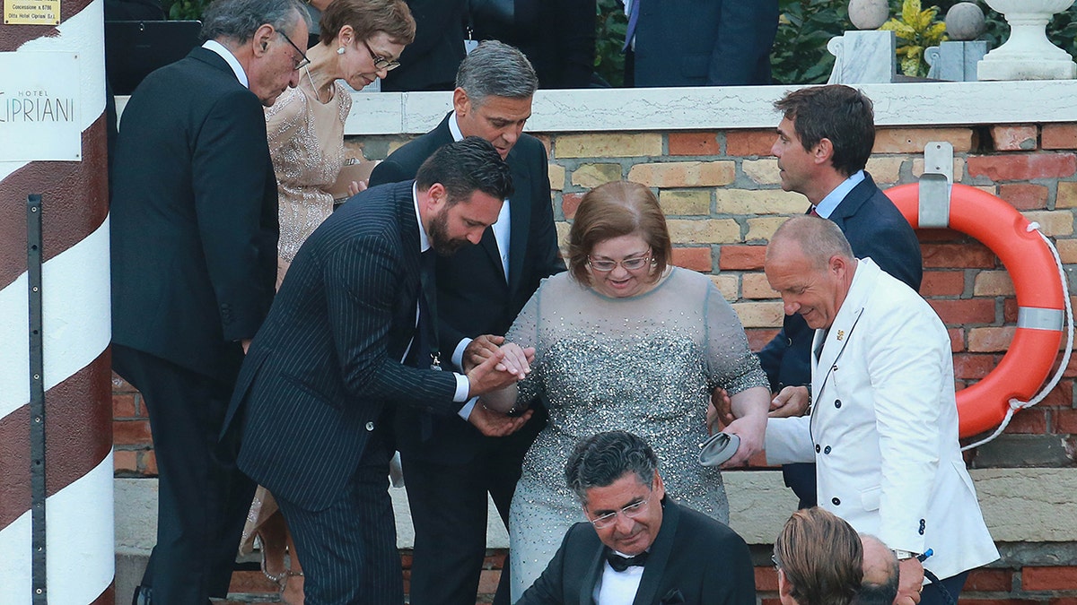 Adelia Zeidler and George Clooney pictured
