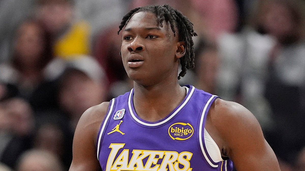 Adou Thiero looks on court