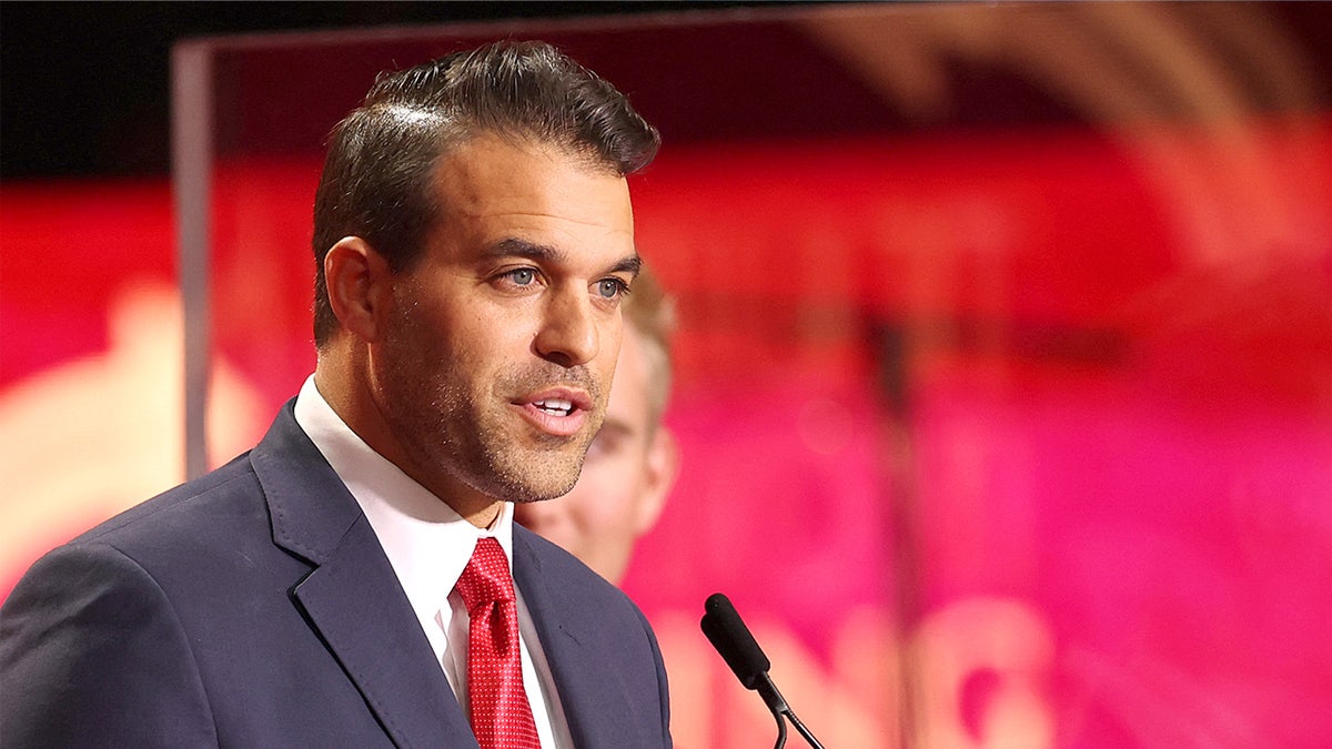 Andrew Kolvet, producer of 'The Charlie Kirk Show,' speaks during the public memorial service for Charlie Kirk at State Farm Stadium in Glendale, Ariz., on Sept. 21.