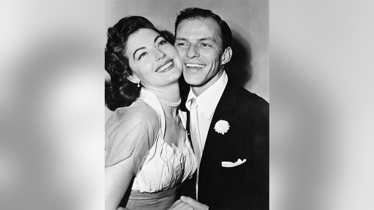 Ava Gardner and Frank Sinatra canoodling on their wedding day.