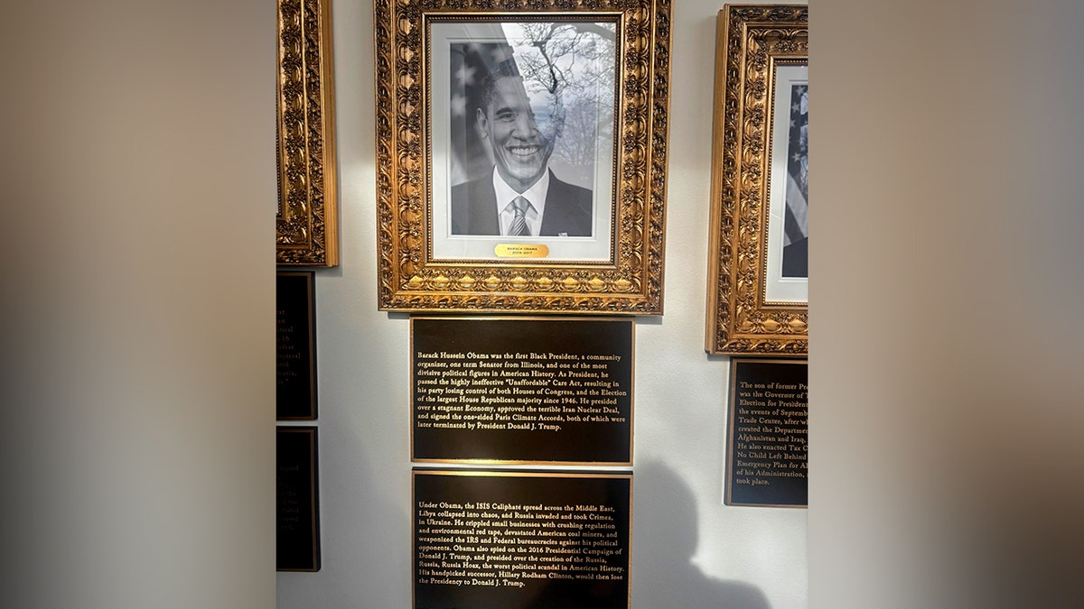 Former President Barack Obama's photo with plaques