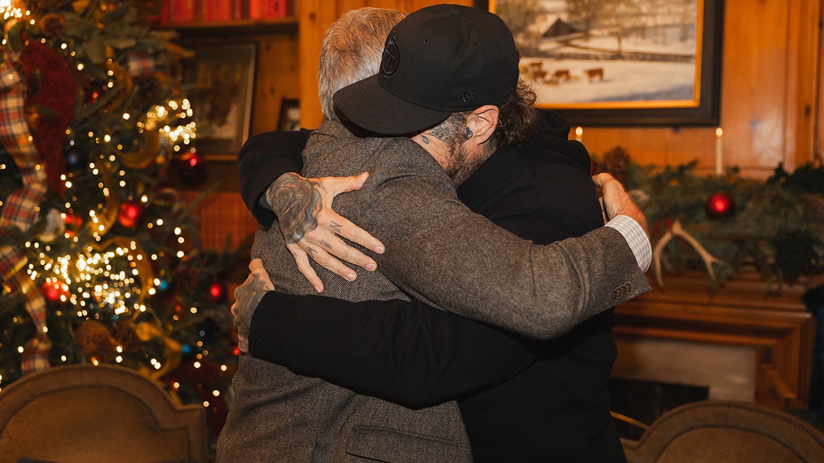 Bill Lee hugging Jelly Roll