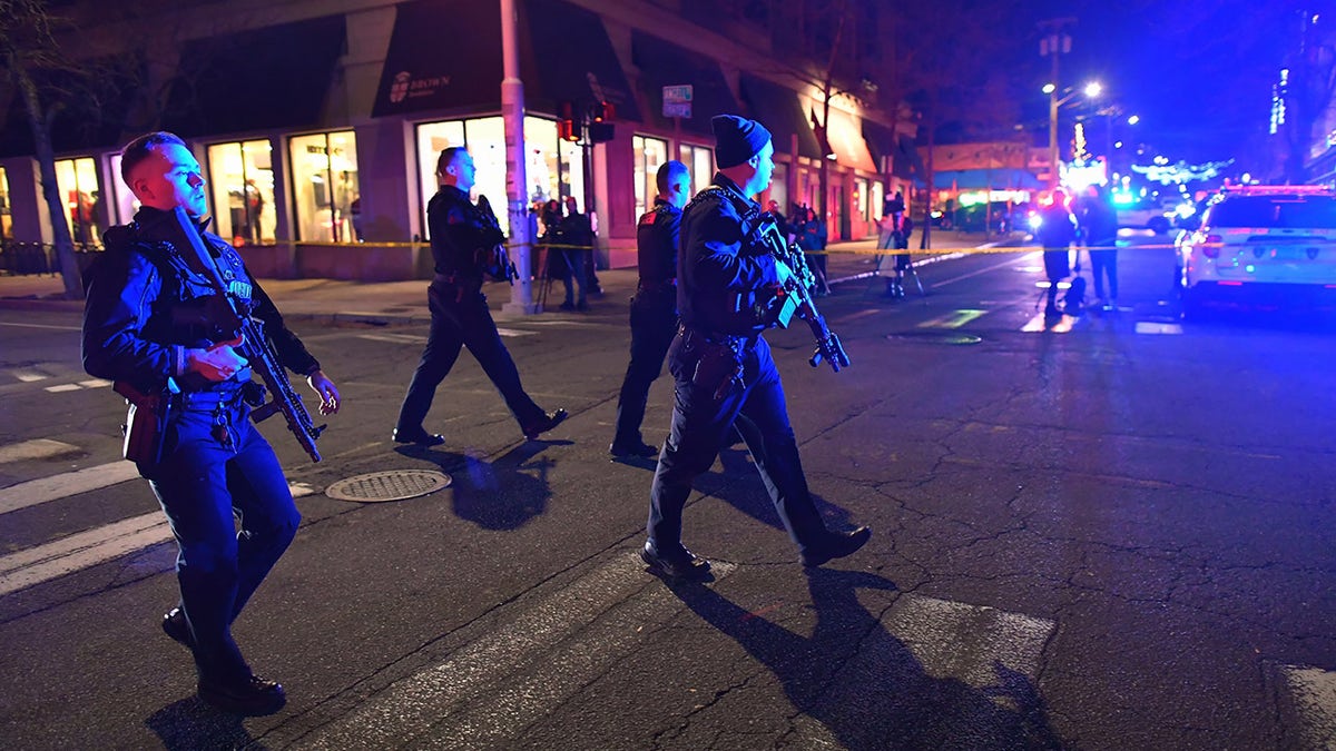 Police patrol a neighborhood in Providence, Rhode Island