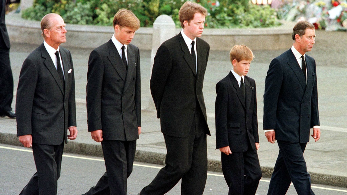 Charles walking alongside his sons at Princess Diana's funeral in 1997.