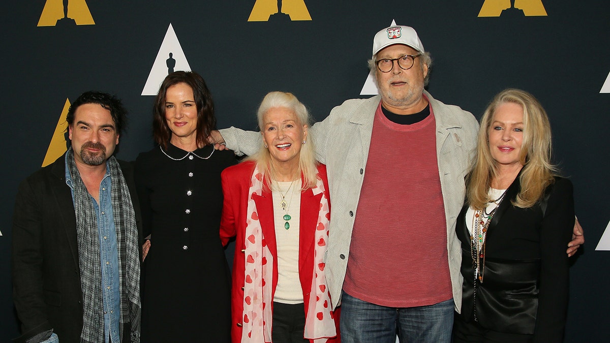 The cast of "National Lampoon's Christmas Vacation" posting together.