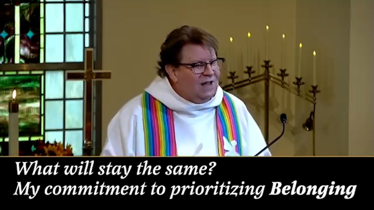 pastor with rainbow stole during church congregation