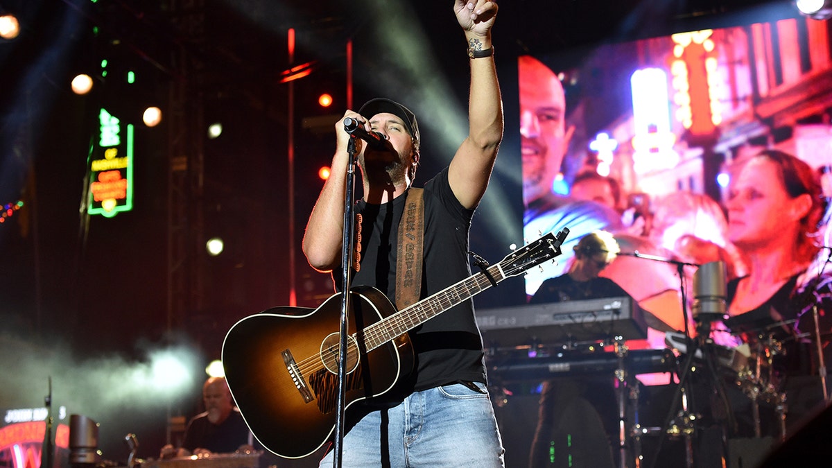 Luke Bryan performing in his Nashville restaurant
