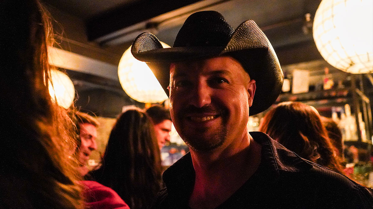 Man in cowboy hat at NYC party