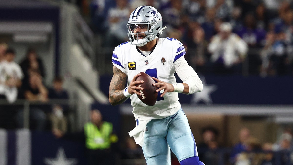 Dak Prescott looks to pass