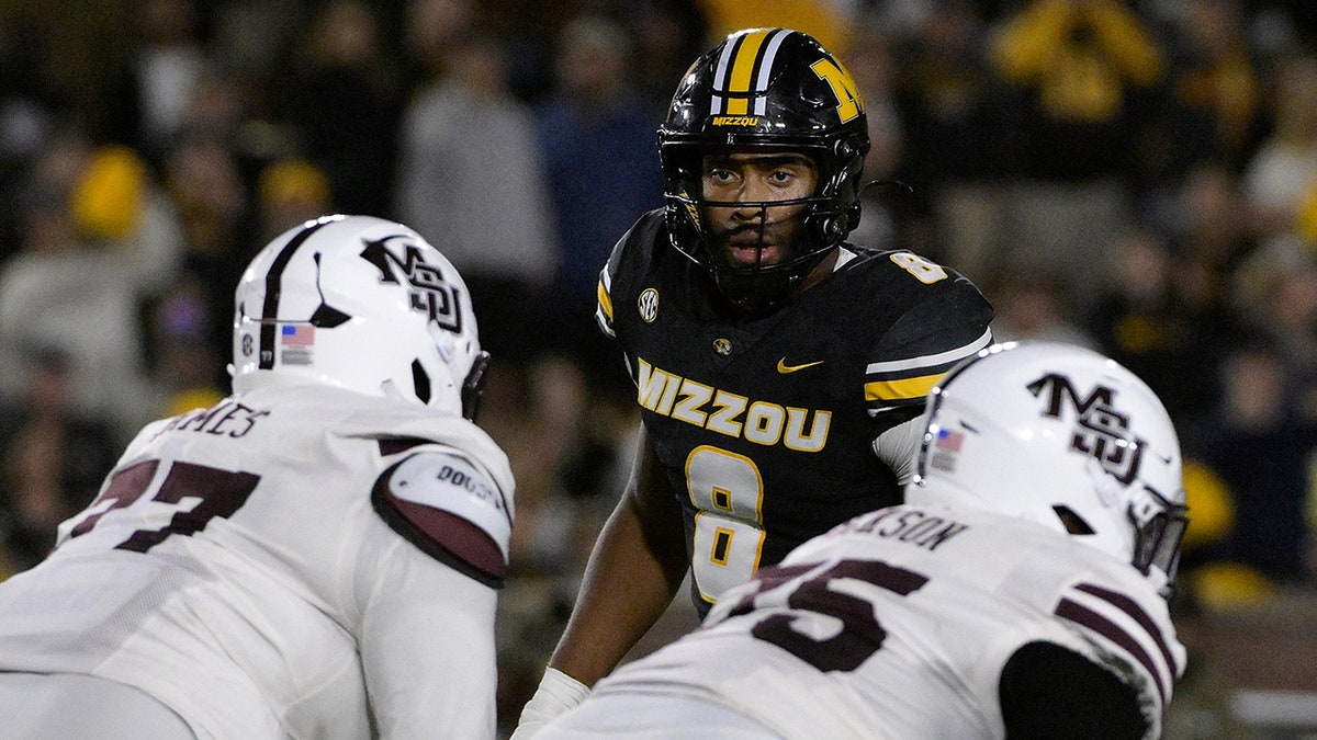 Damon Wilson II looks on during a game
