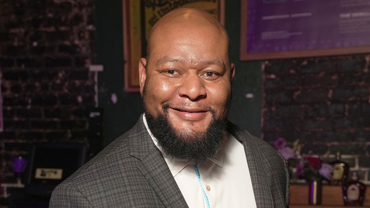 Deuce McAllister poses