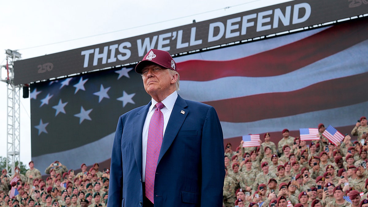 President Donald Trump walks onto the stage to address U.S. Army troops during a rally at Fort Bragg.