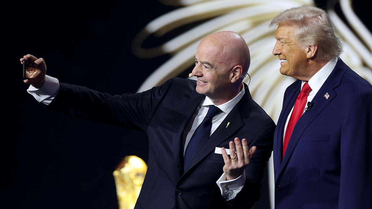 Donald Trump and Gianni Infantino pose for a selfie