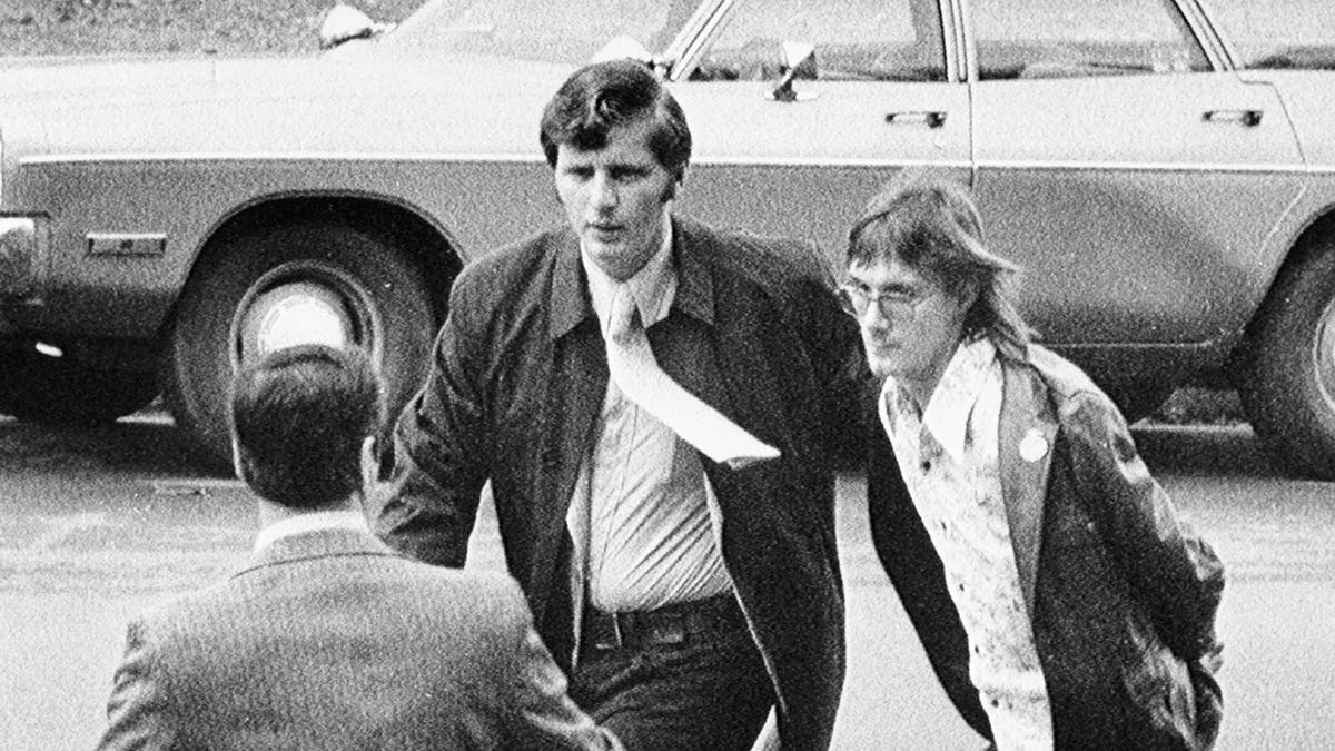 Doug Gretzler being arrested.