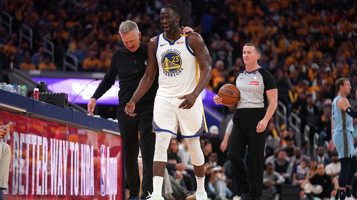 Draymond Green interacts in Steve Kerr