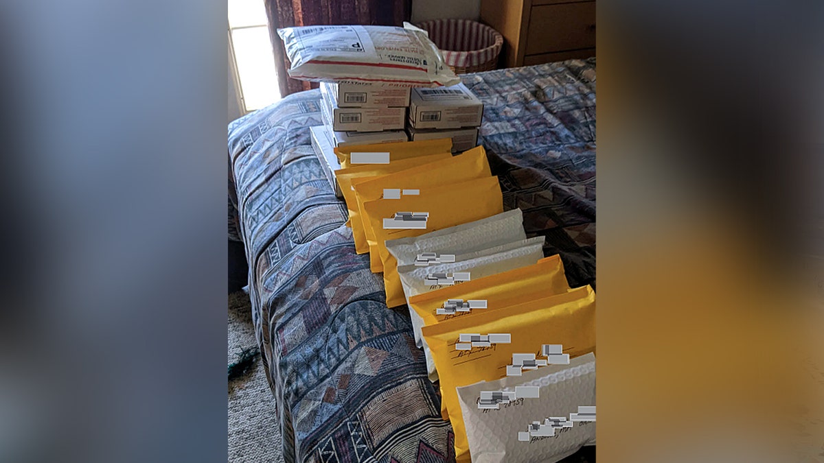 numerous packages on bed