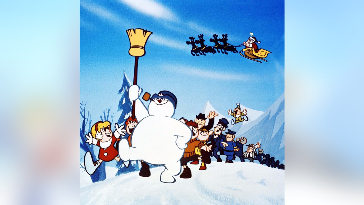 Frosty the Snowman holding a broom.