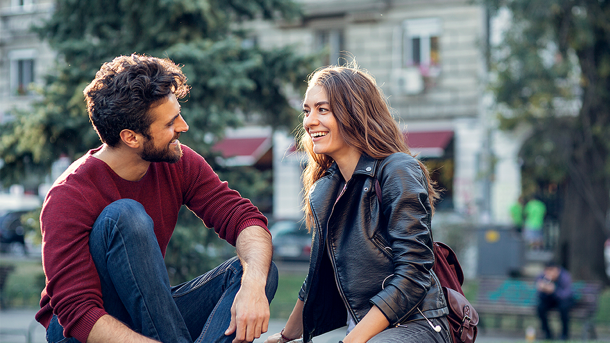 Young couple together on campus