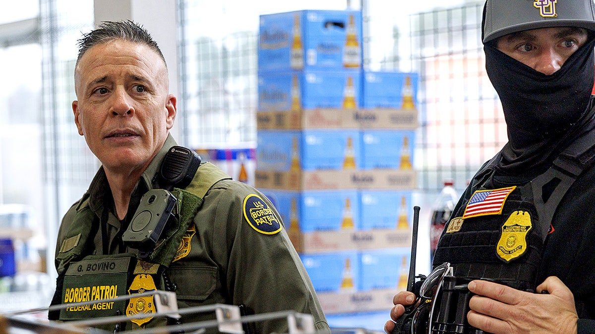 Border Patrol Commander Greg Bovino stands near a convoy of agents’ vehicles parked outside a convenience store in New Orleans.