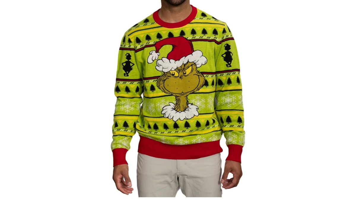 ’Tis the season to be a Grinch and this sweater lets everyone know it.