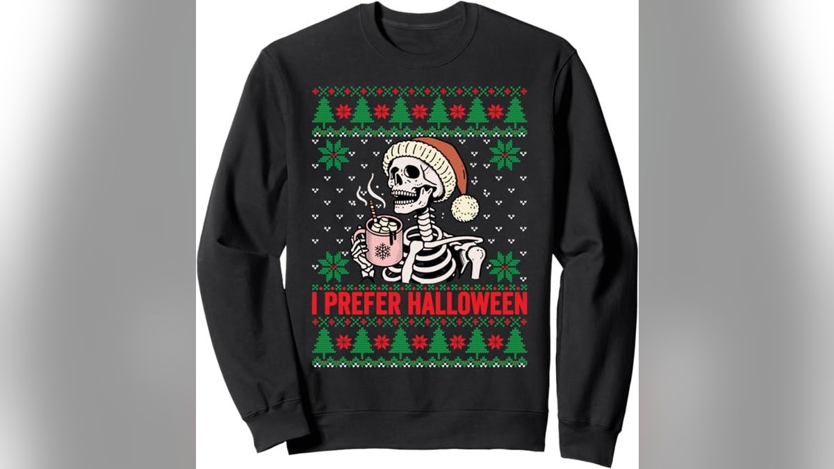 This Christmas sweater is for the person not ready to let go of Halloween.