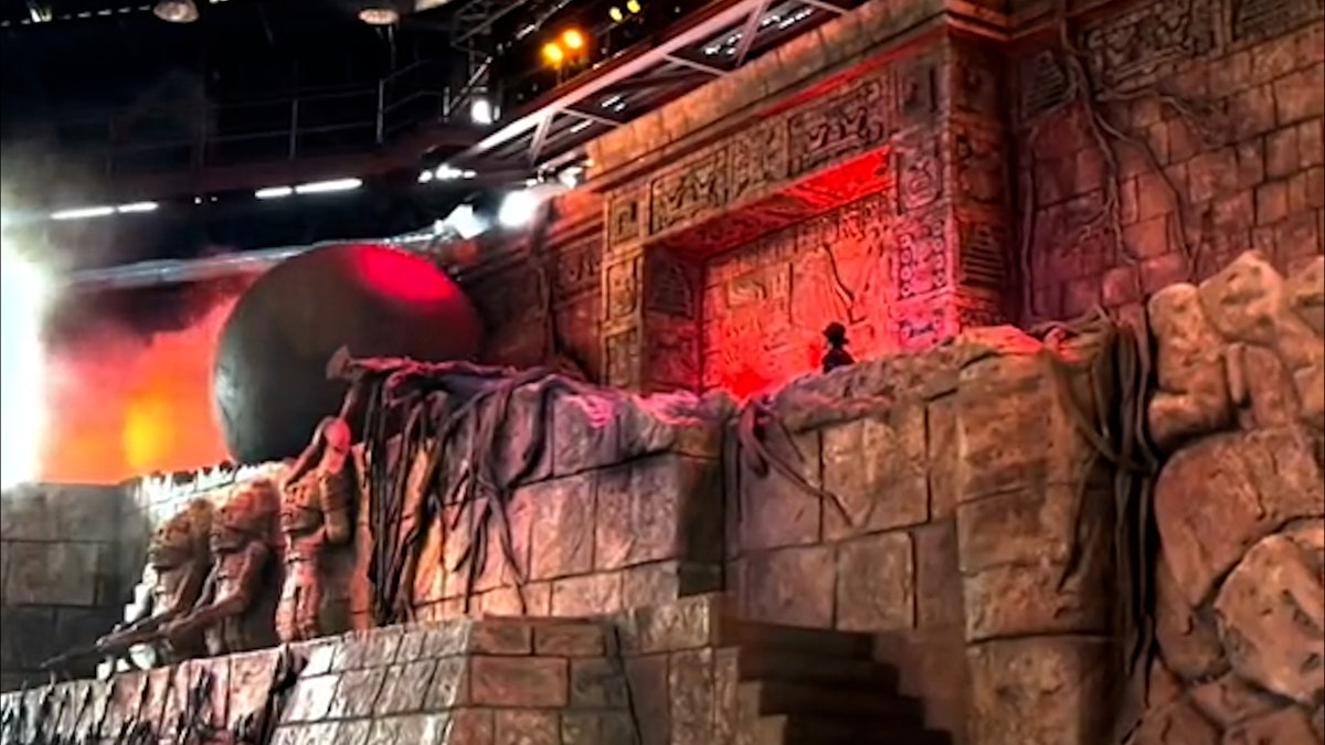 massive boulder rolls down ramp of disney world stunt show