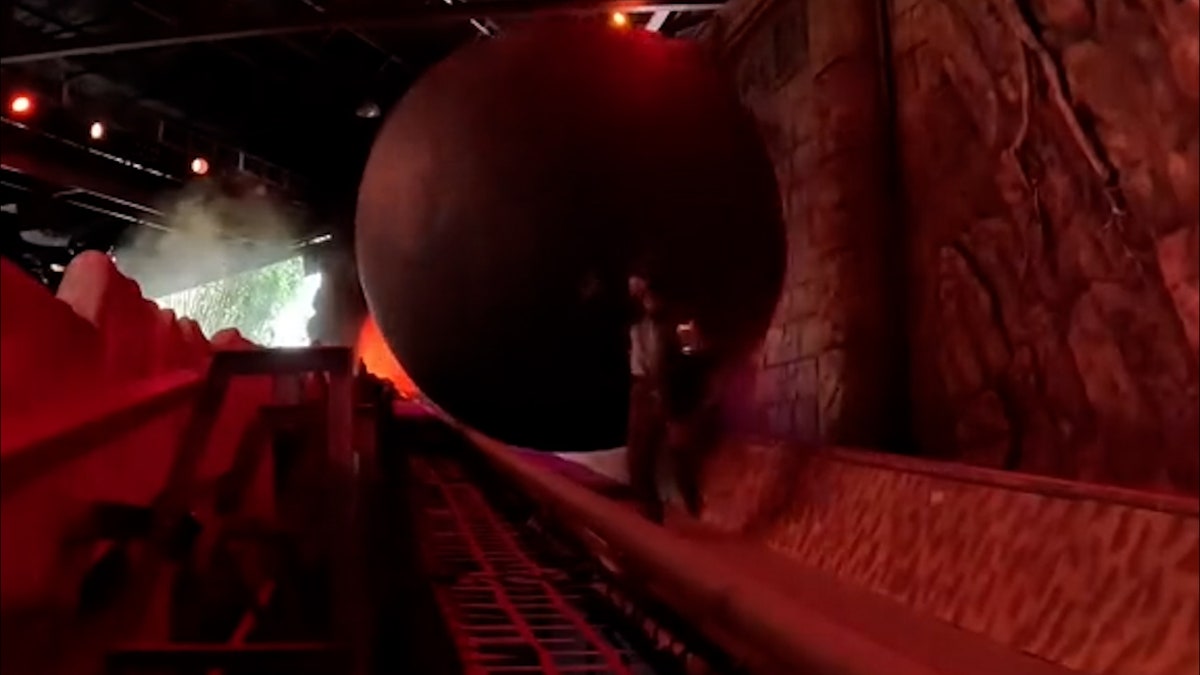 massive boulder rolls down ramp of disney world stunt show