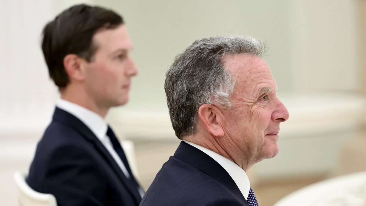 U.S. officials sit across from Russia’s president during a high-level meeting at the Kremlin.