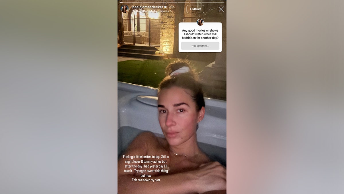 Jessie James Decker in a hot tub 