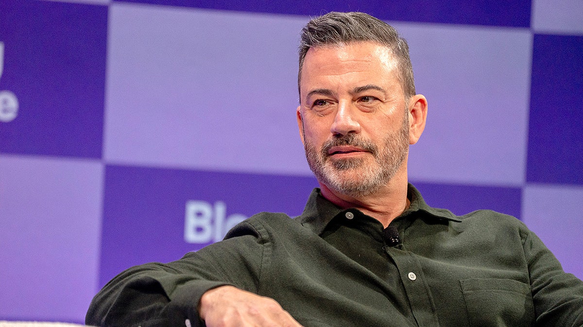 Late-night host Jimmy Kimmel speaks onstage during a media industry conference event.