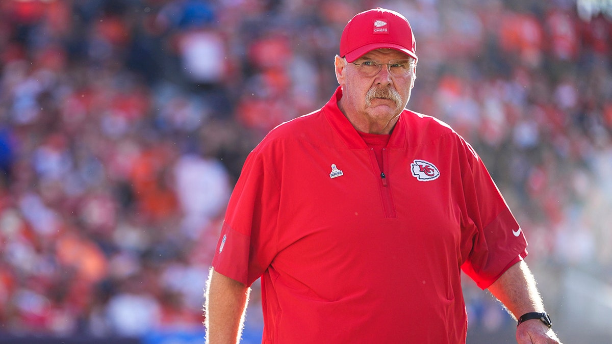Kansas City Chiefs head coach Andy Reid walking out of tunnel at Empower Field at Mile High