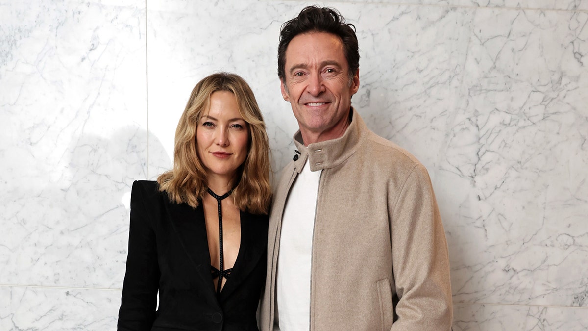 Hugh Jackman and Kate Hudson attend movie screening "a blue song" December 2025.