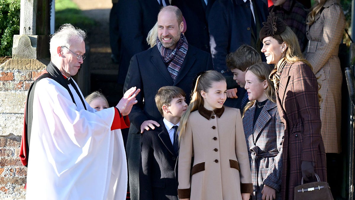 Kate Middleton chatting with a priest on Christmas Day.