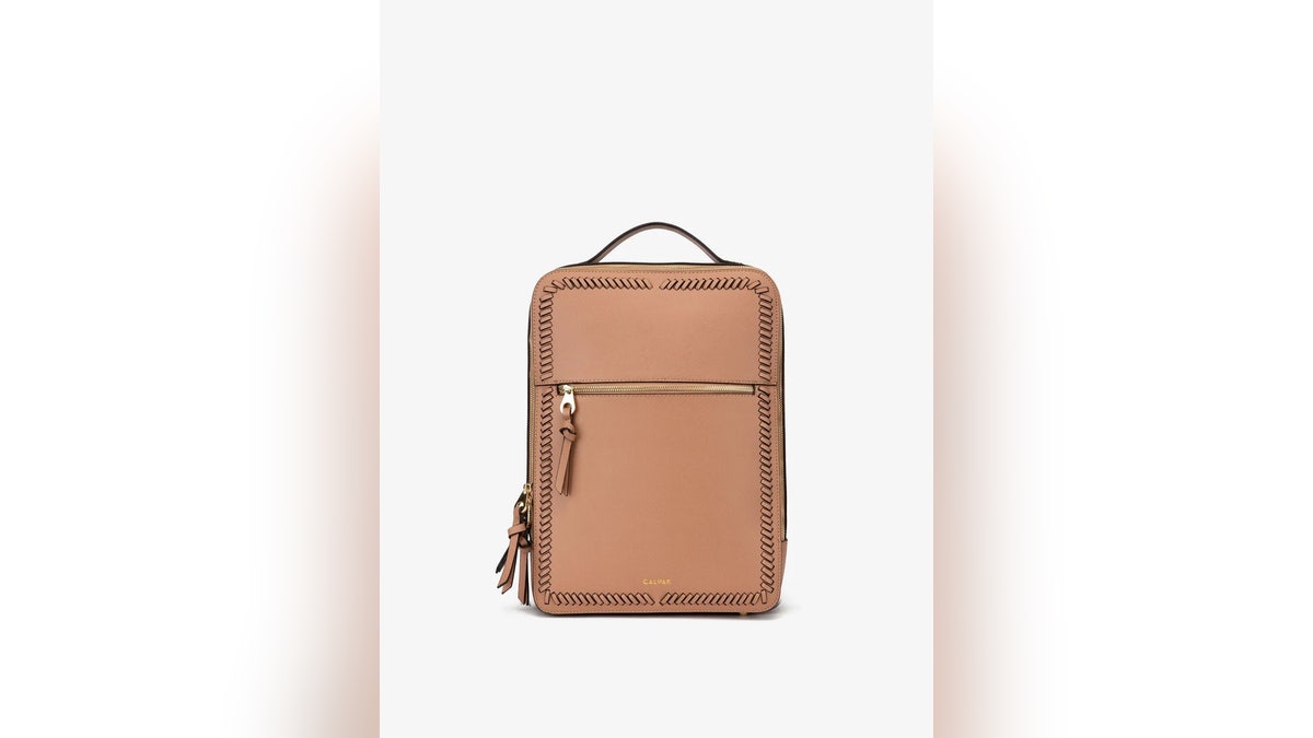Store essentials and a laptop in this handy backpack from Calpak.