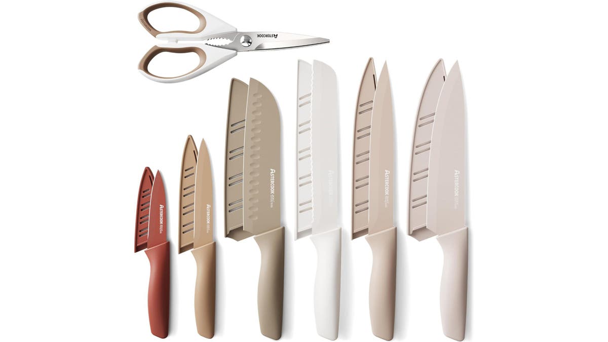 This knife set also includes a pair of kitchen scissors.