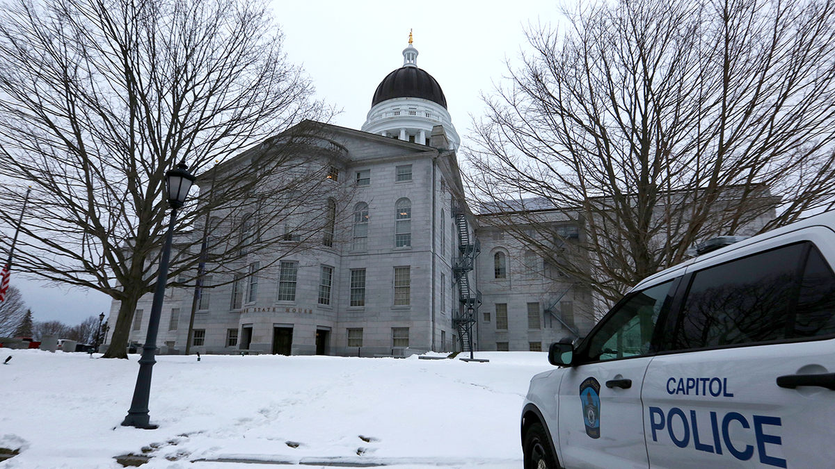 The Maine State Capitol, left, and a police car, right.